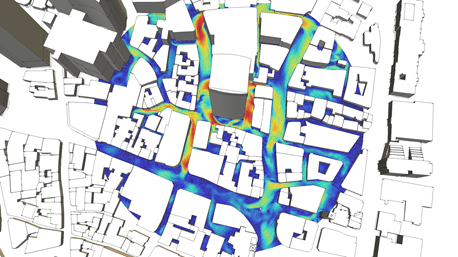 Top view of city with a multi-wind direction transient CFD analysis showing high wind speeds (red) in an urban area