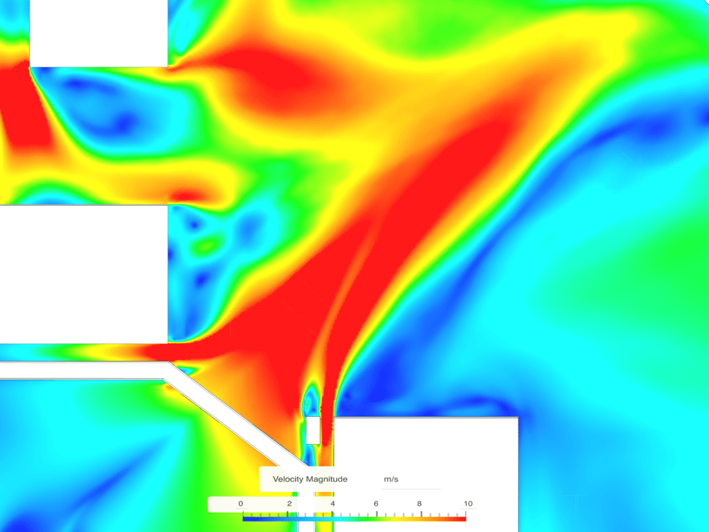 Wind speed results from a CFD analysis showing the channeling effect for an improved design with street furniture and structures